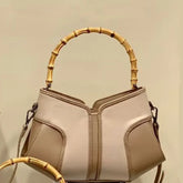 Bamboo handle colorblock leather handbag