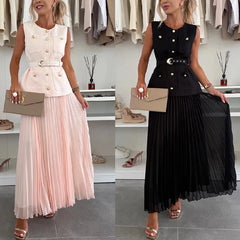 Two women modeling dresses with a beige clutch in a store setting.