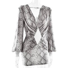 Patterned dress on a mannequin with a white background