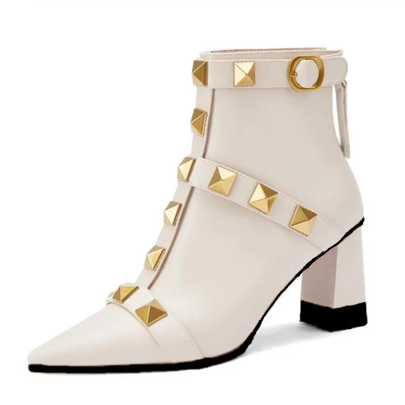 Beige studded pointed toe block heel ankle boots close-up