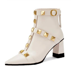 Beige studded pointed toe block heel ankle boots close-up