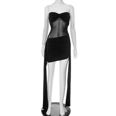 Black dress with sheer overlay on a mannequin against a white background