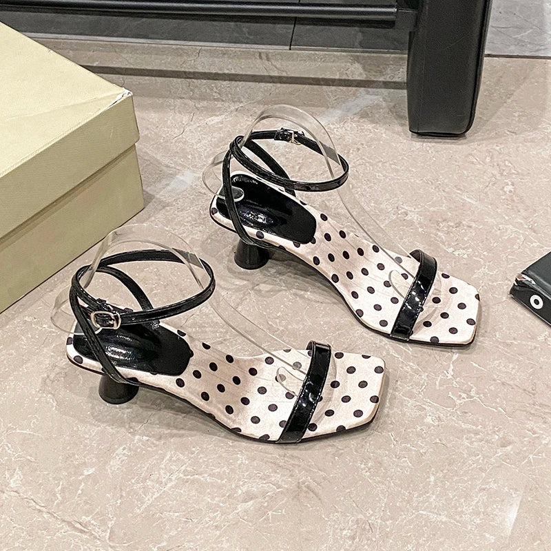 Black and white polka dot ankle strap heels