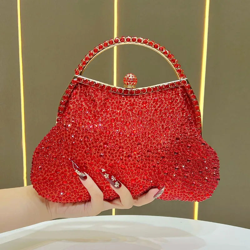 Red crystal-encrusted top handle clutch bag