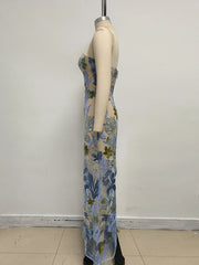 Floral dress on a mannequin against a plain background