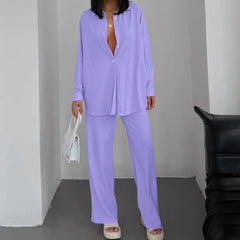 Person wearing a light purple outfit - full view