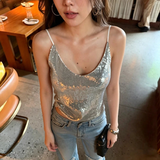 Sparkly sequin v-neck camisole top worn with denim