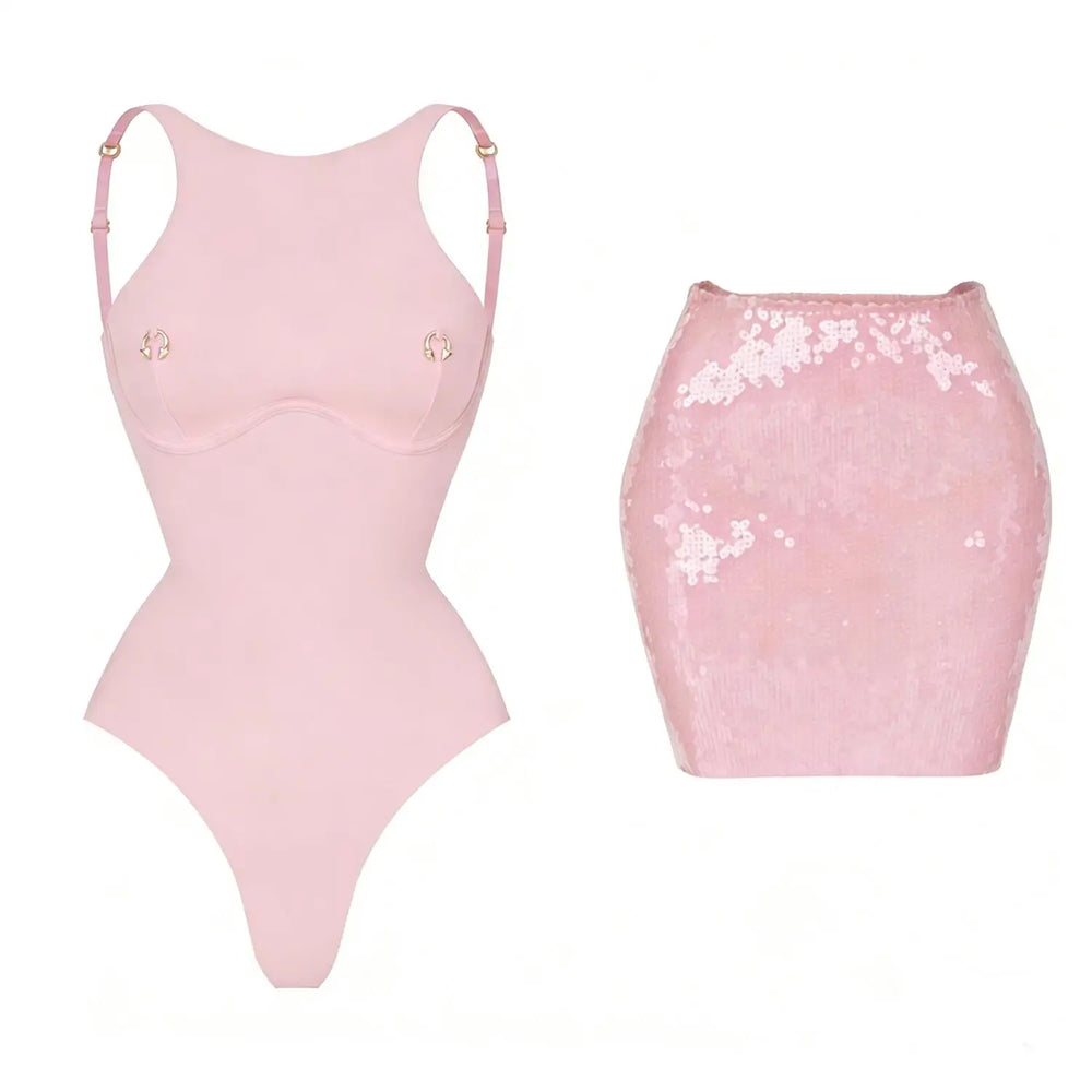Pink sequin bikini and skirt swimwear set.