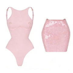 Pink sequin bikini and skirt swimwear set.