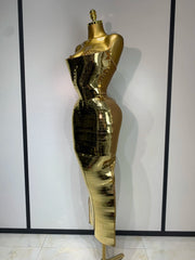 Side view of a strapless crystal-embellished bodycon maxi dress in gold.