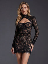 Black lace mini dress with high neck and cutout detail