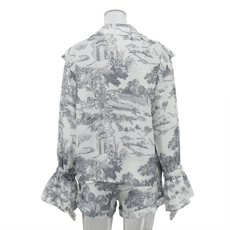 Floral patterned blouse on a mannequin against a white background