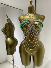 Multi-layer beaded body chain swimwear set with cascading strands in green, blue, and pink.