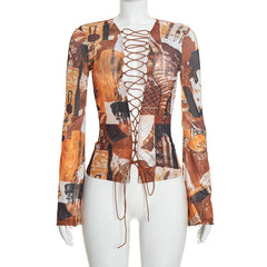 Printed long sleeve lace-up top on mannequin
