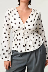Polka dot ruched waist v-neck peplum top detail view