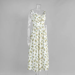 Floral dress on a mannequin against a gray background