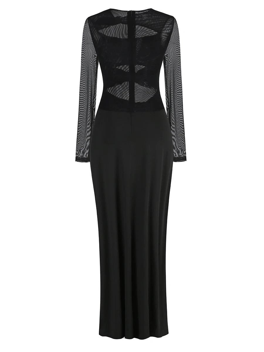 Black evening gown with sheer sleeves on a white background