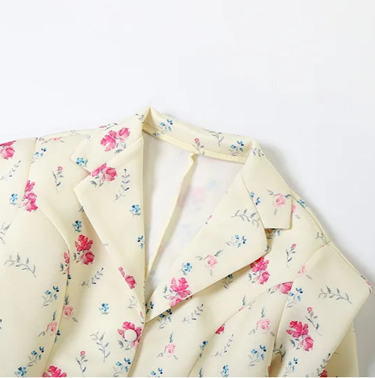 Floral-patterned blazer on a white background