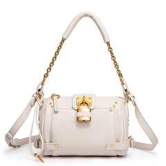 White structured leather bag with gold lock detail and chain strap