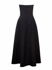 Black strapless dress on a white background