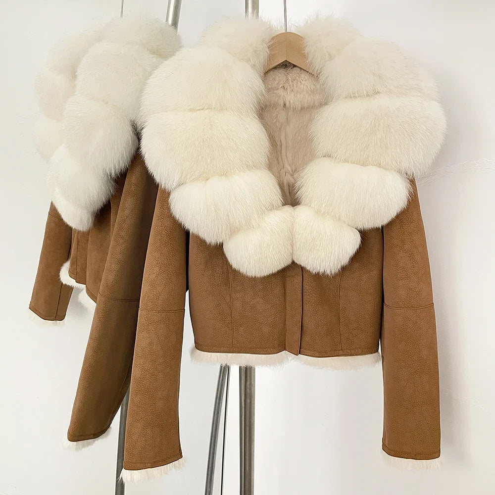 Brown suede jacket with white fur trim on a stand against a white background