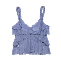 Blue ruffled top on a white background