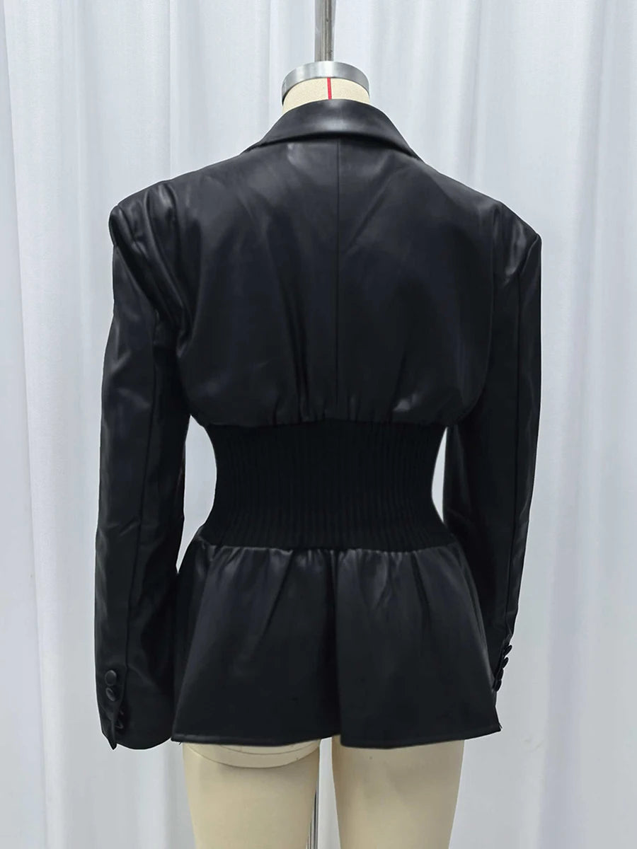 Black jacket with peplum waist on a mannequin against a white background