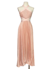 Pink pleated dress on a mannequin against a white background