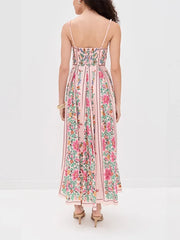 Woman wearing a floral dress on a white background