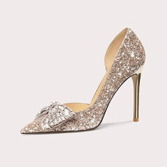 Sparkly high-heeled shoe on a light gray background
