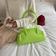 Lime green short handle tote bag with zipper closure.