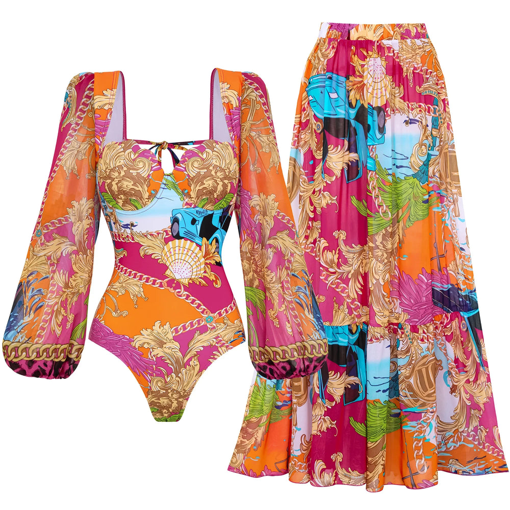 Flat lay of a printed long sleeve swimsuit top and a matching maxi skirt.