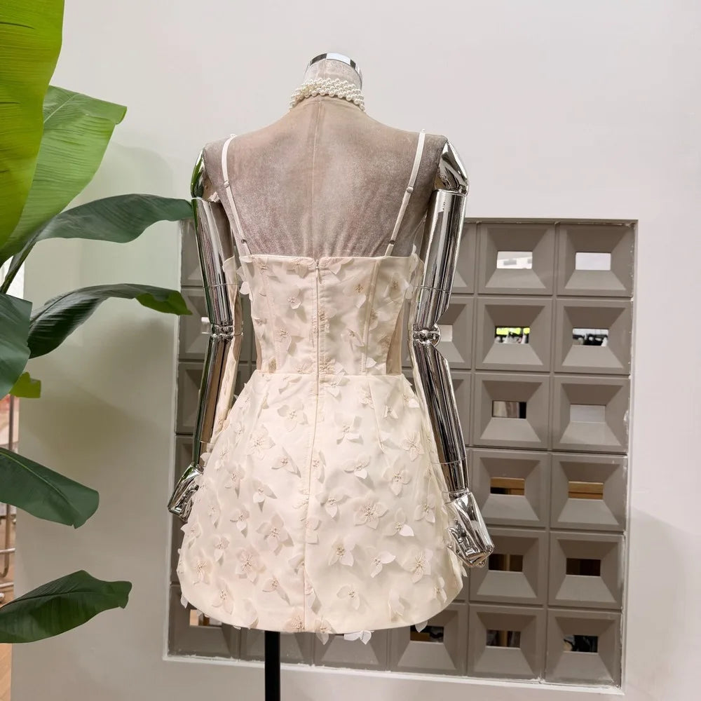 Pearl strap floral mini dress back view white