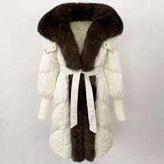 White winter coat with a fur collar and belt on a white background