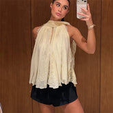 Pleated halter neck sleeveless top with lace trim