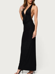 Black halter neck gown on a white background
