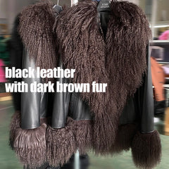 Black leather jacket with dark brown fur trim on a hanger.
