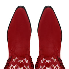 Top view of the pointed toe detail on red fringe western boots.