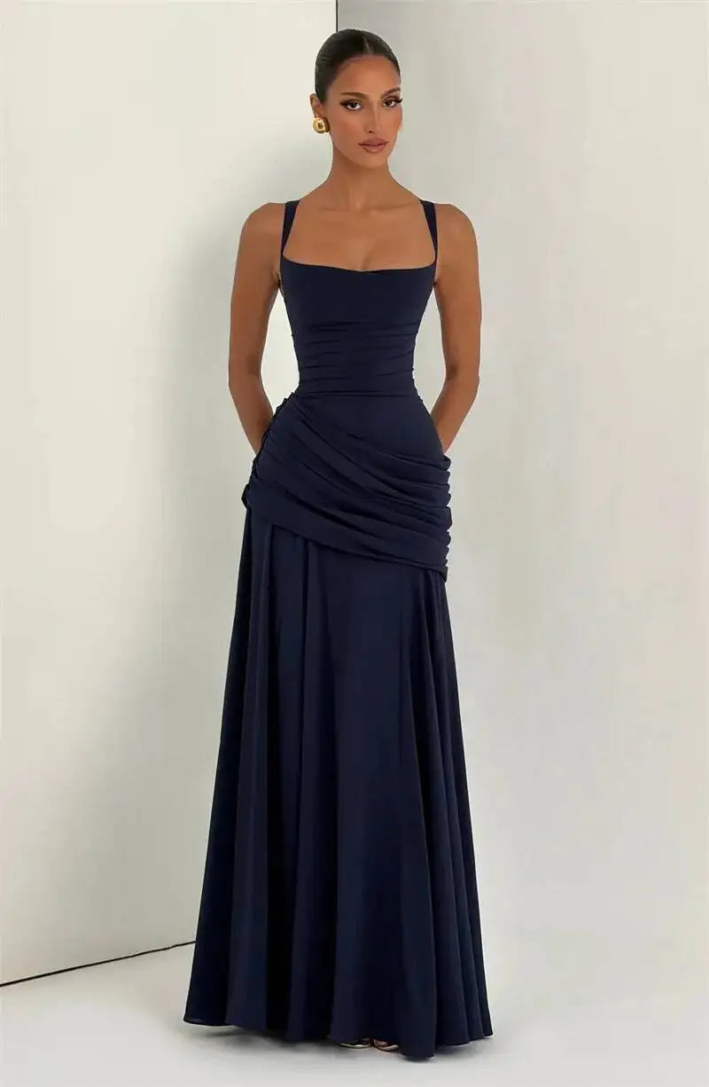 Full body view of deep blue square neck drape waist floor-length dress