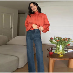 Standneck long sleeve blouse with fold ribbon and button cuffs