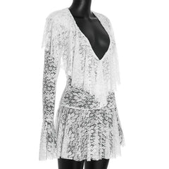 Lace dress on a mannequin against a white background