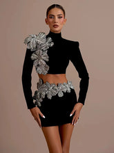 Turtleneck long sleeve crop top and matching mini skirt set with floral crystal embellishments