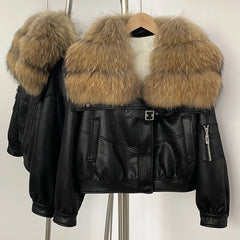 Black leather jacket with fur hood on a mannequin against a white background