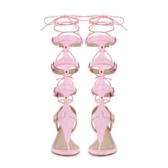 Pair of pink lace-up gladiator kitten heel sandals