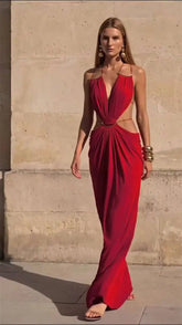 Red halter neck draped maxi dress with gold chain detail
