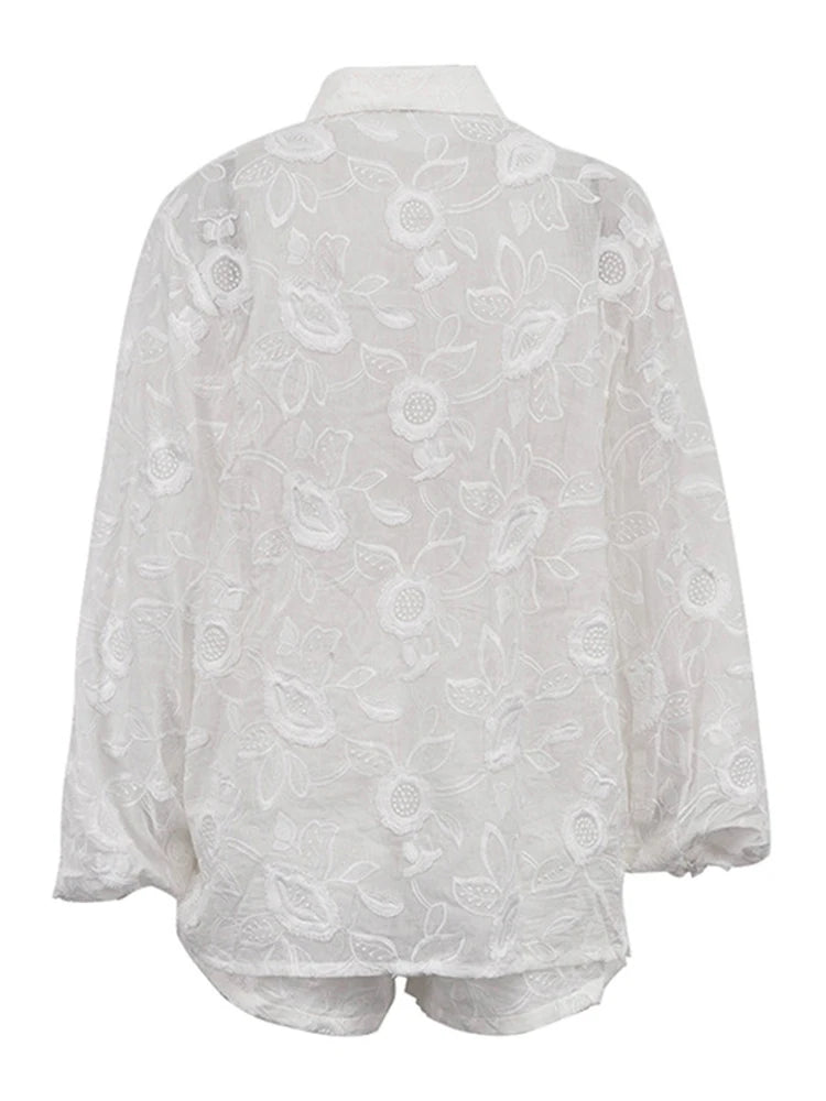White lace blouse on a white background