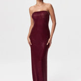 Burgundy strapless gown with sequin detailing on a white background