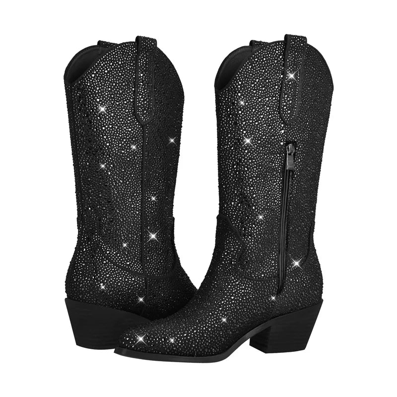 Pointed toe embellished western boots with all-over rhinestone detailing and a side zipper.