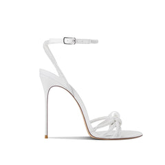 White high-heeled sandal with ankle strap on a white background
