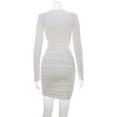 White long-sleeve dress on a mannequin against a white background